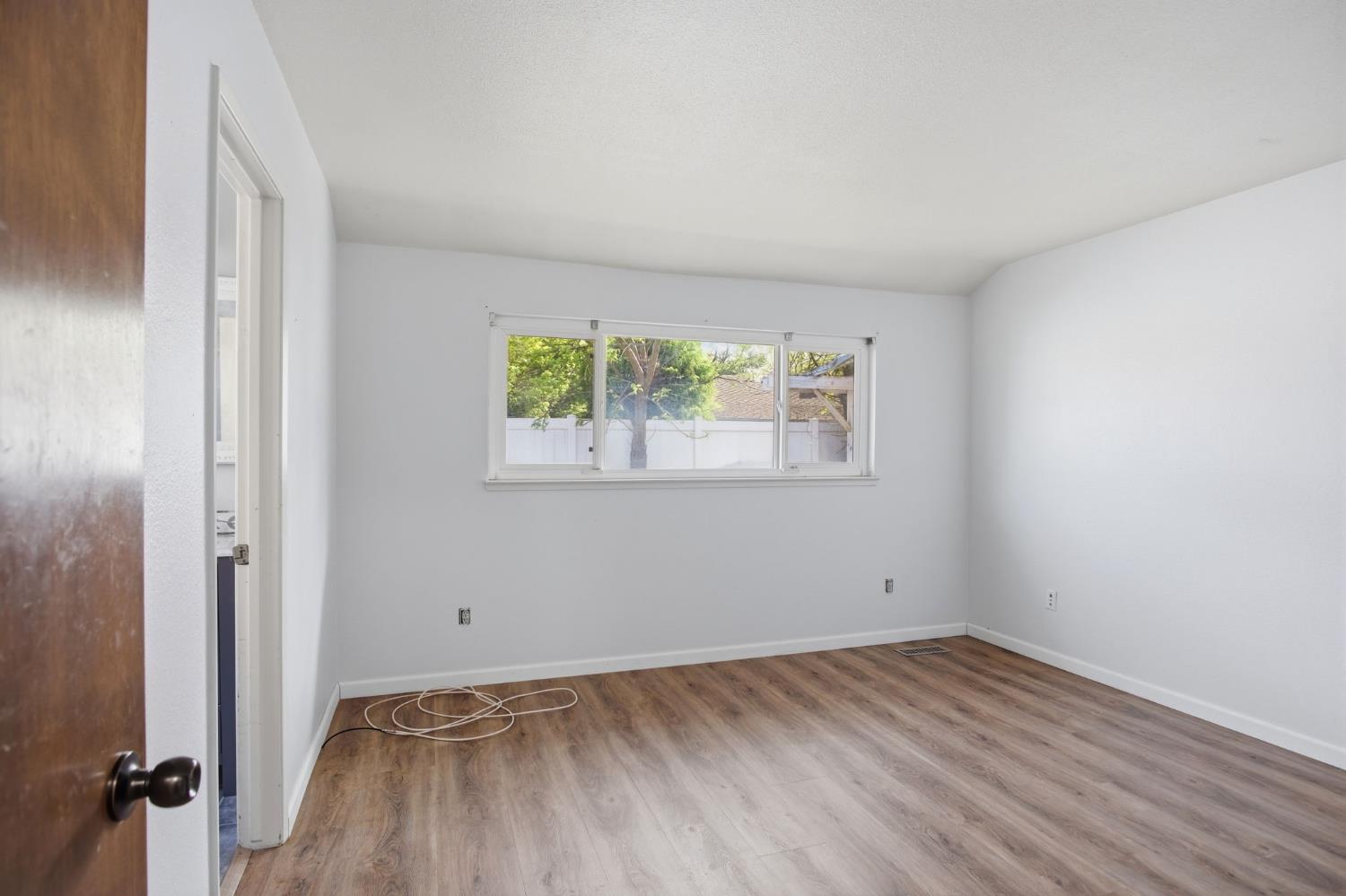 1436 Montclair Drive Modesto, CA 95350 - Photo 23 of 29 an empty room with a window