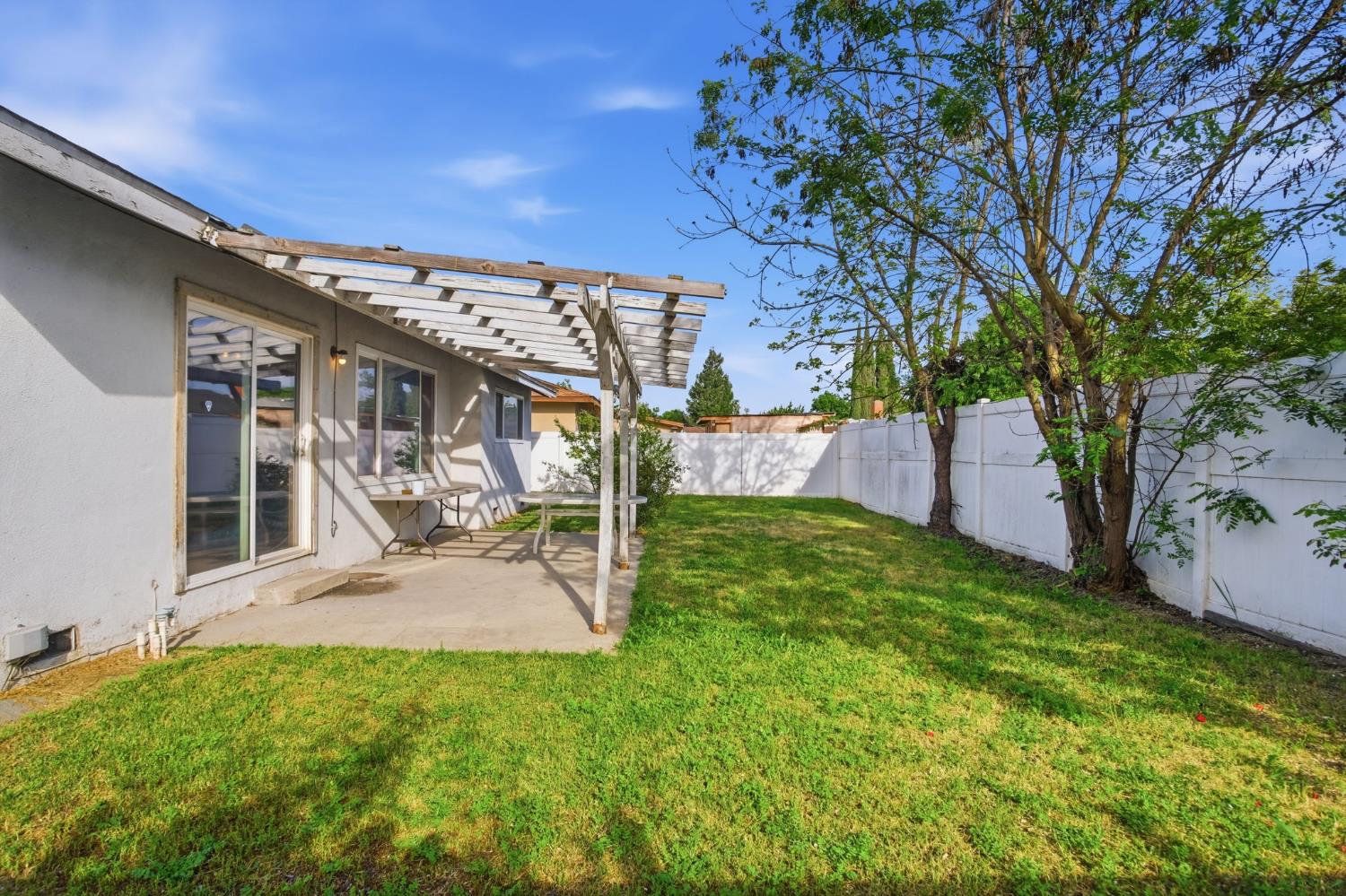1436 Montclair Drive Modesto, CA 95350 - Photo 28 of 29 a view of a house with a backyard