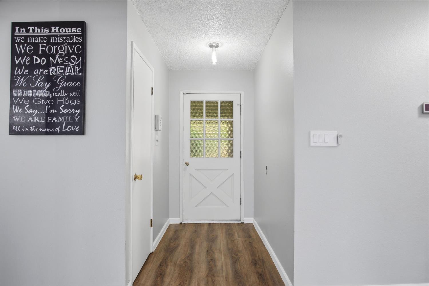 1436 Montclair Drive Modesto, CA 95350 - Photo 5 of 29 a view of a hallway with a window