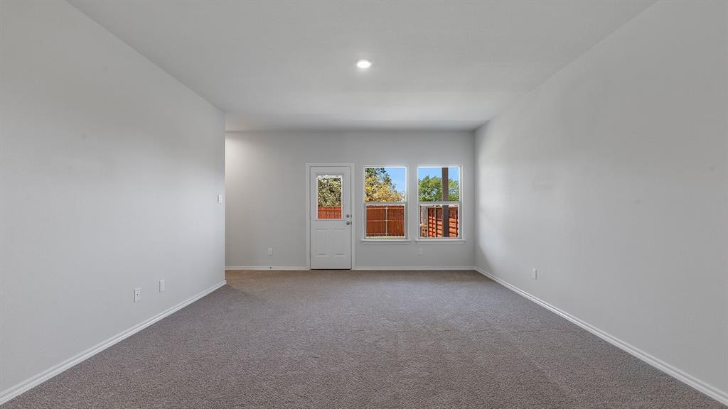 138 Mojave Road Boyd, TX 76023 - Photo 9 of 40 an empty room with windows