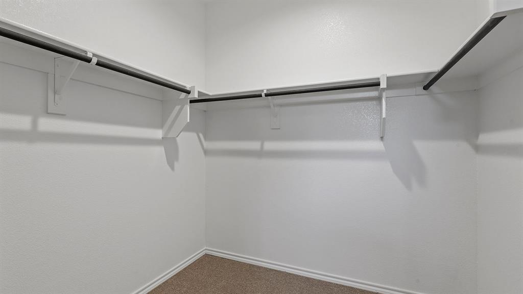 138 Mojave Road Boyd, TX 76023 - Photo 18 of 40 a view of a room with racks on the wall