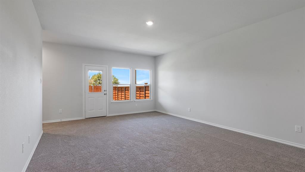 138 Mojave Road Boyd, TX 76023 - Photo 8 of 40 an empty room with windows