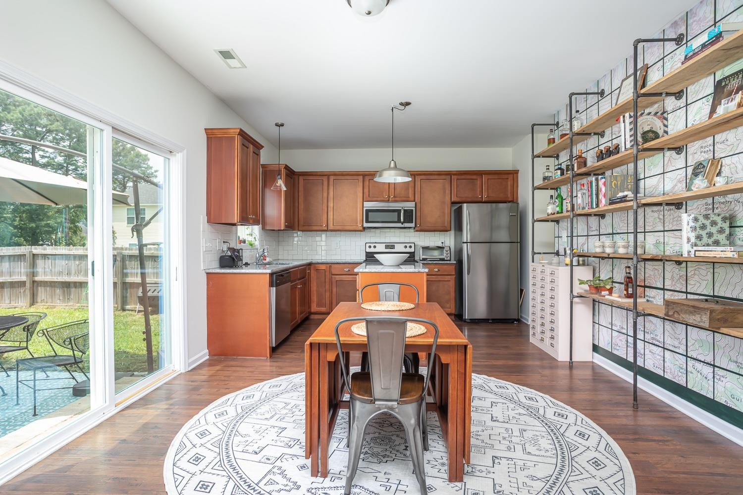 322 Forest Lane Wendell, NC 27591 - Photo 19 of 37 a view of a kitchen with dining table and chairs