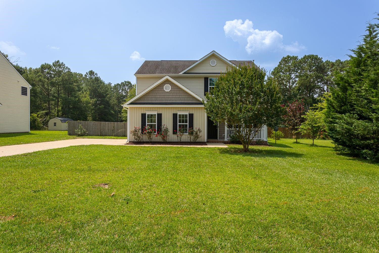 322 Forest Lane Wendell, NC 27591 - Photo 2 of 37 a front view of a house with a yard