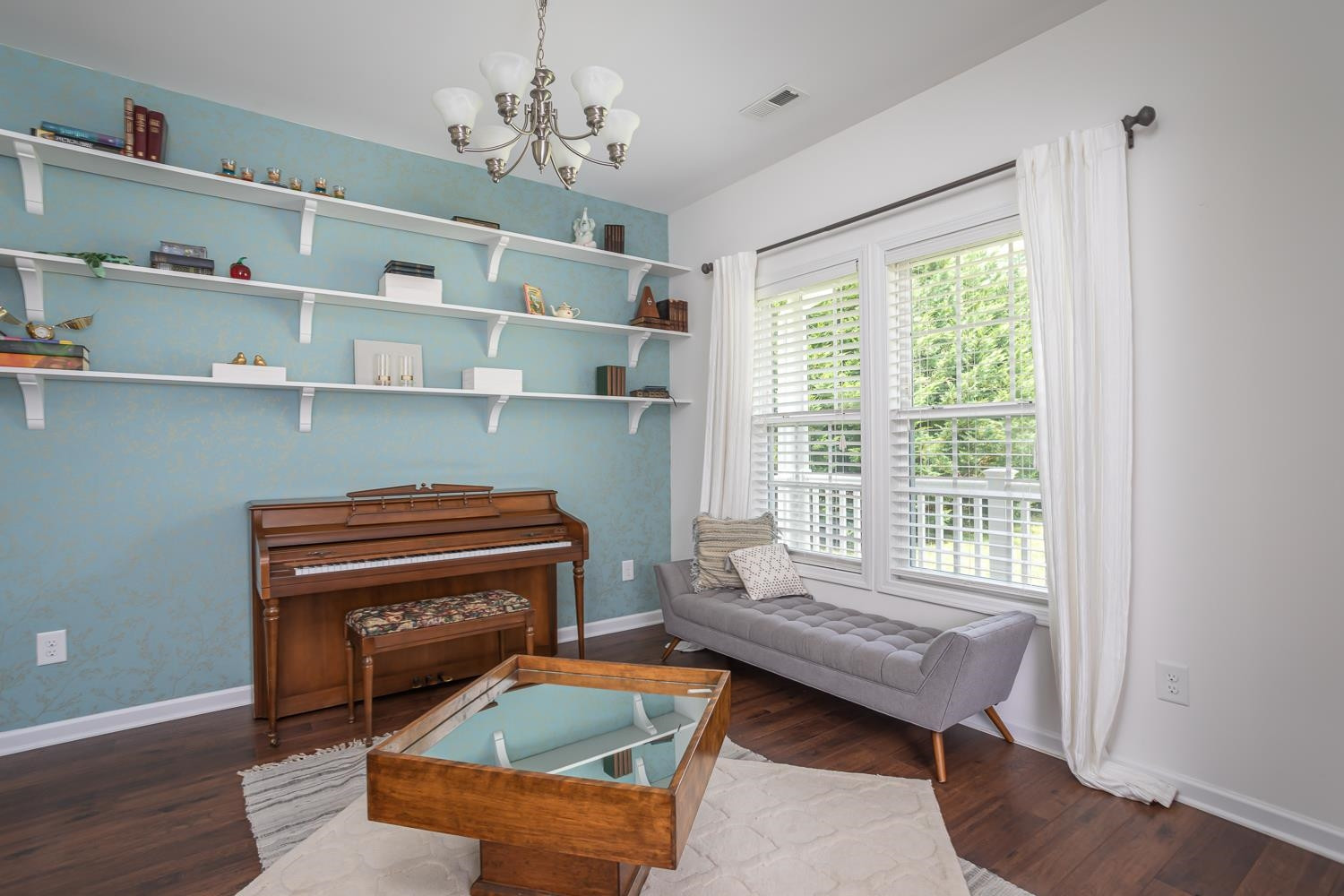 322 Forest Lane Wendell, NC 27591 - Photo 26 of 37 a living room with furniture and a piano