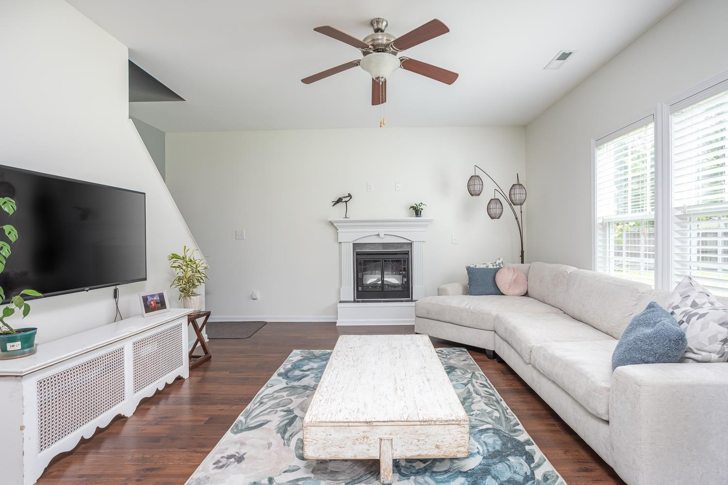 322 Forest Lane Wendell, NC 27591 - Photo 27 of 37 a living room with furniture and a flat screen tv