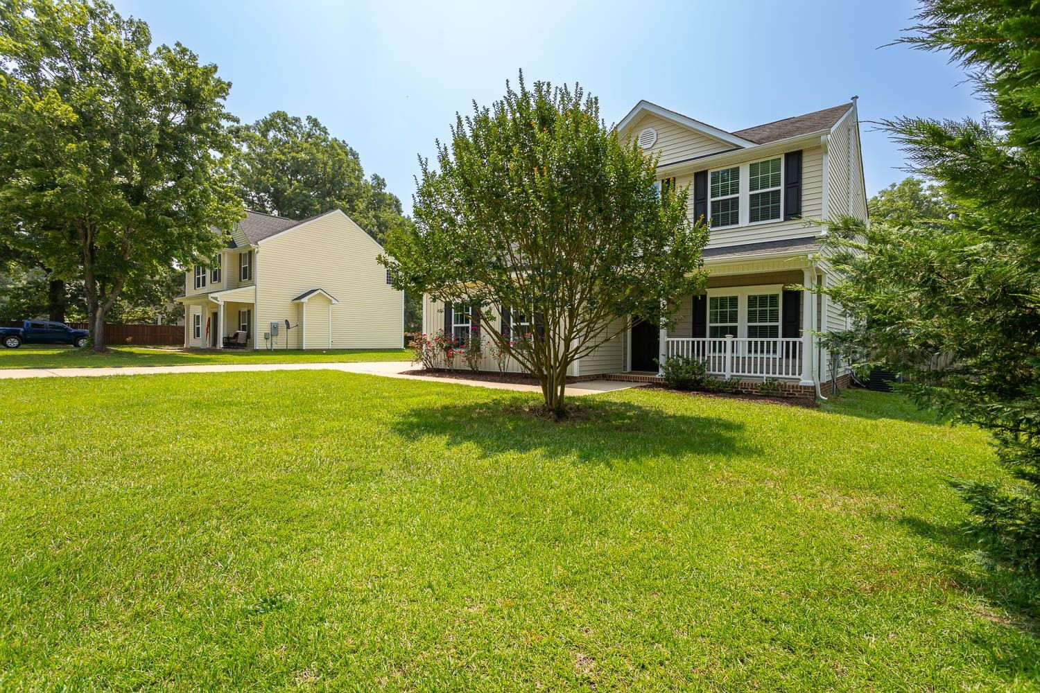 322 Forest Lane Wendell, NC 27591 - Photo 3 of 37 a view of a house with a big yard and palm trees