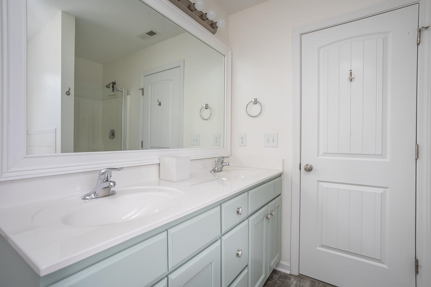 322 Forest Lane Wendell, NC 27591 - Photo 32 of 37 a bathroom with a sink and a mirror