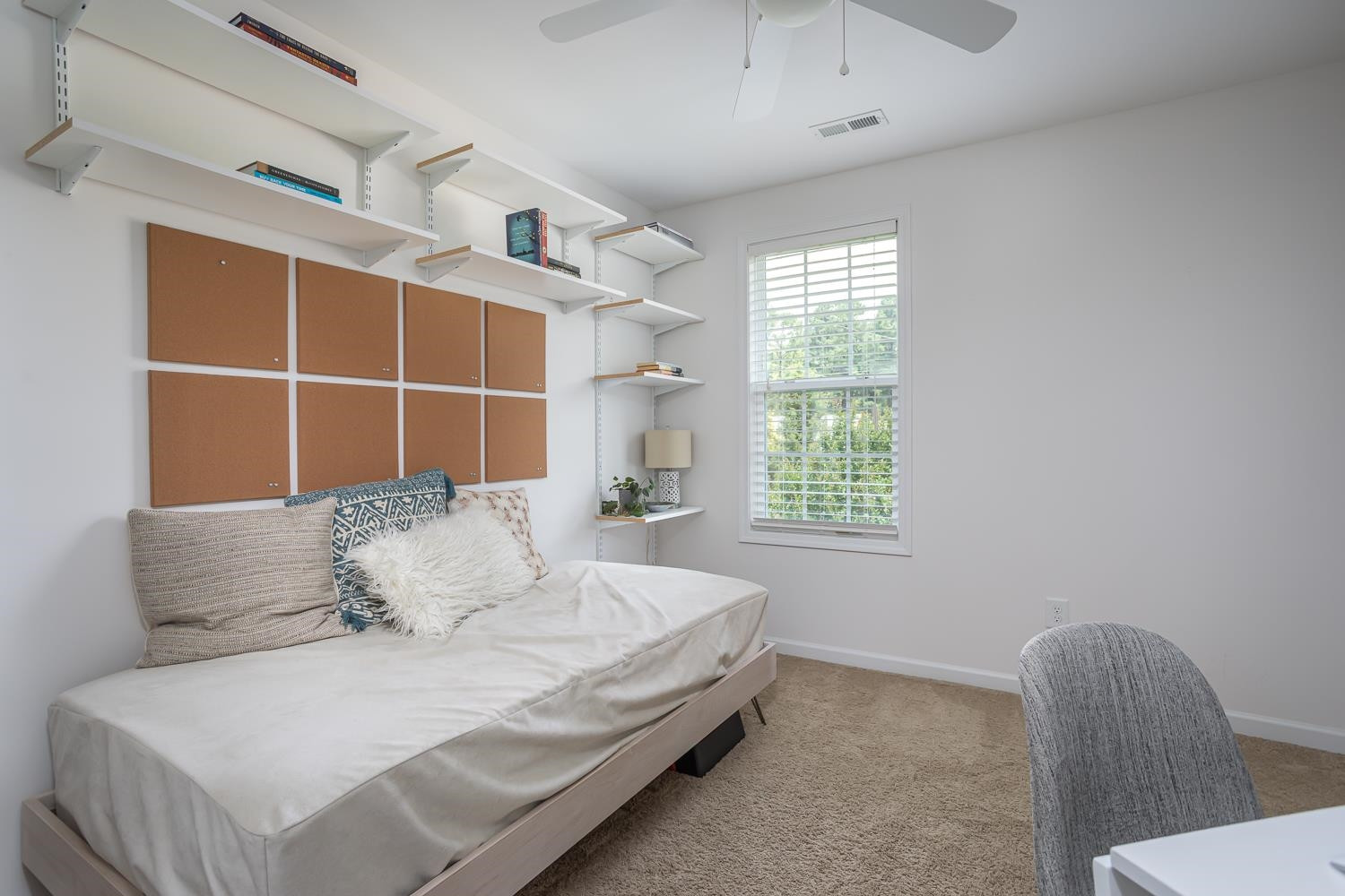 322 Forest Lane Wendell, NC 27591 - Photo 36 of 37 a bedroom with a bed and window