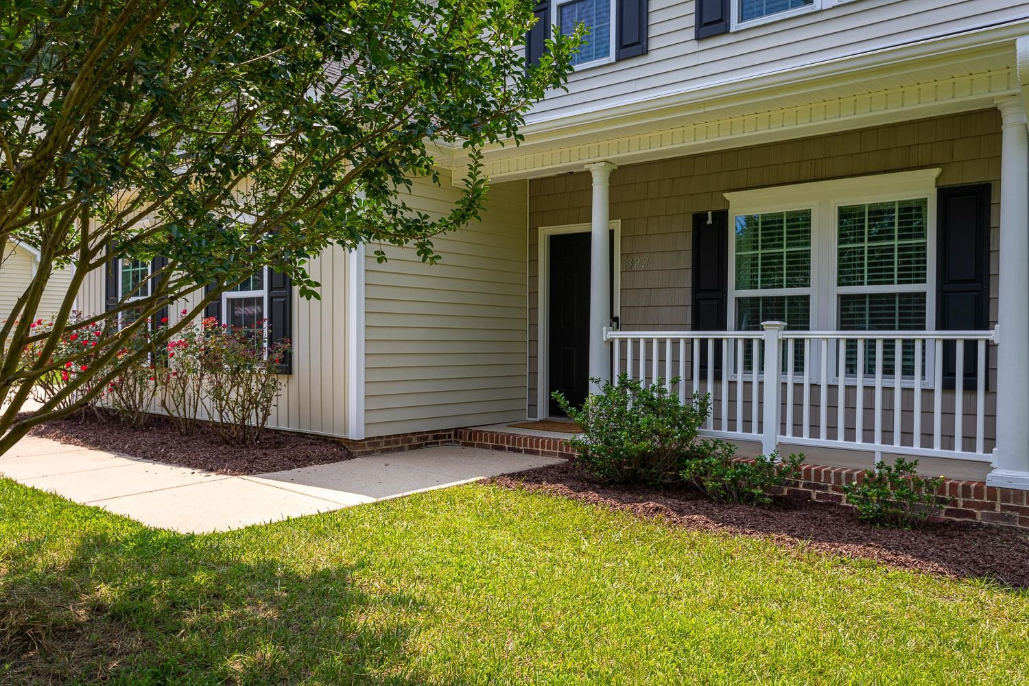 322 Forest Lane Wendell, NC 27591 - Photo 4 of 37 a front view of a house having yard