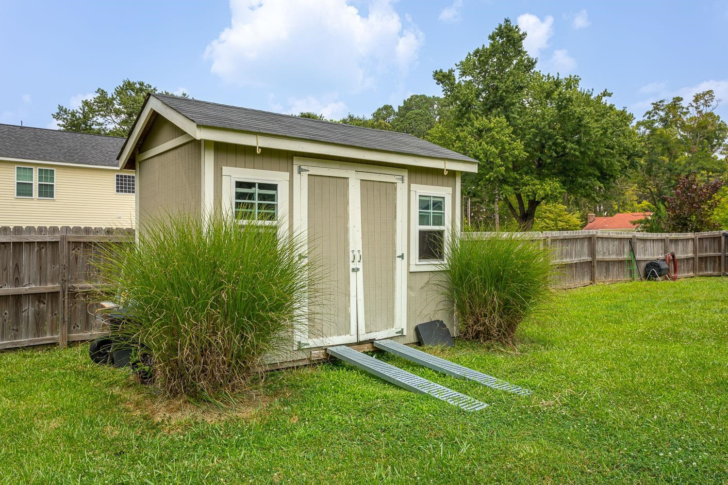 322 Forest Lane Wendell, NC 27591 - Photo 8 of 37 a view of a house with a yard and plants