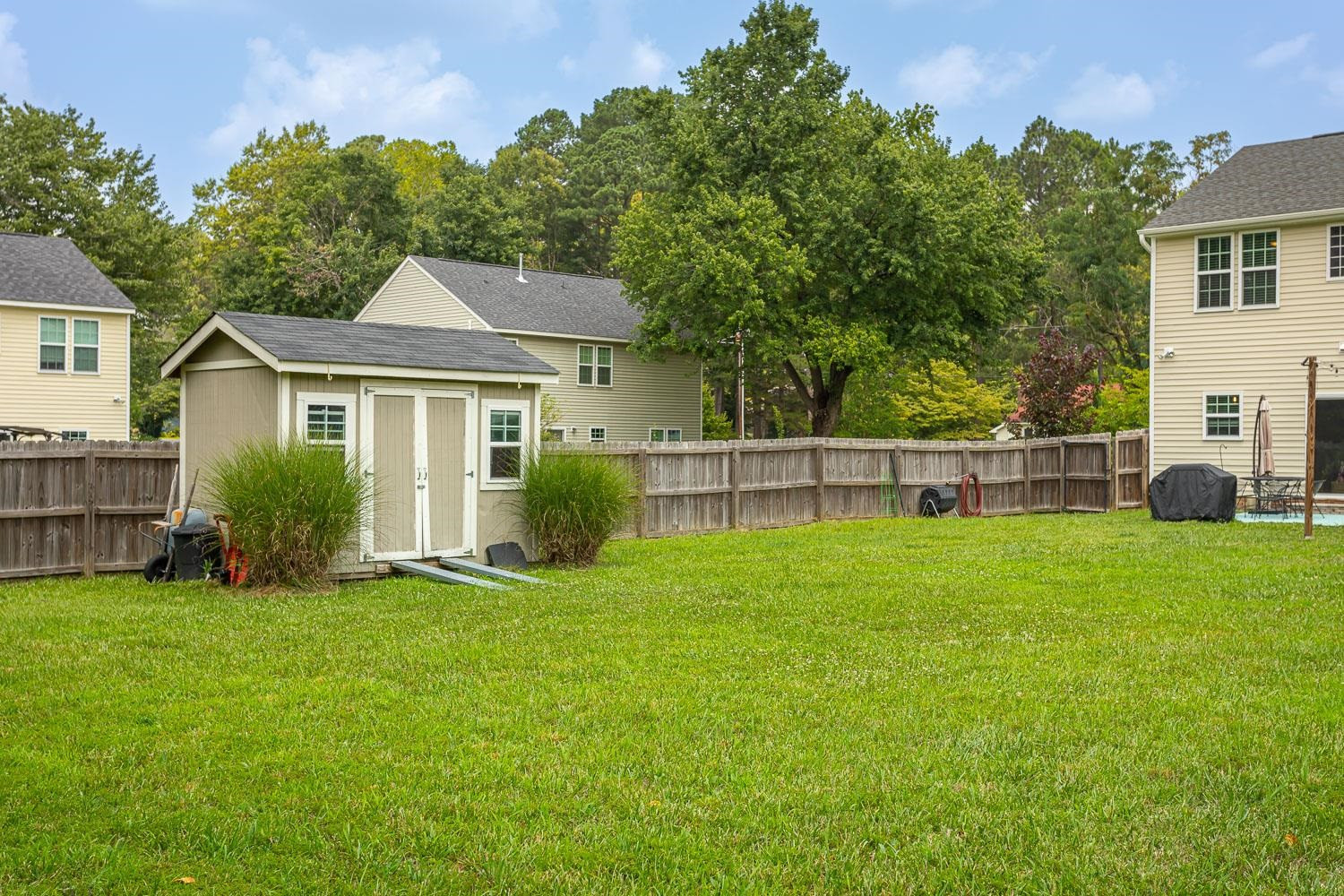 322 Forest Lane Wendell, NC 27591 - Photo 9 of 37 a front view of a house with a yard and porch