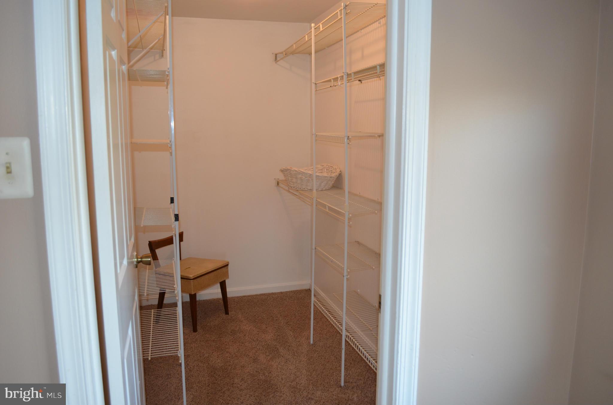 2380 Uniontown Road Westminster, MD 21158 - Photo 22 of 30 Large walk-in closet with shelving