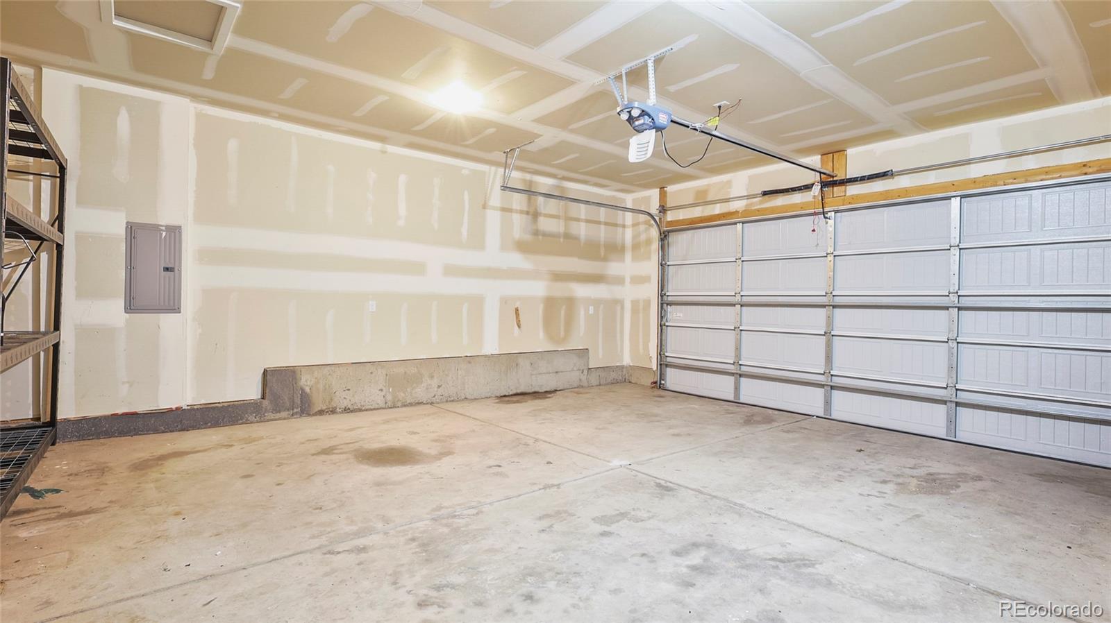 1106 Johnson Street Wiggins, CO 80654 - Photo 15 of 22 a view of a garage