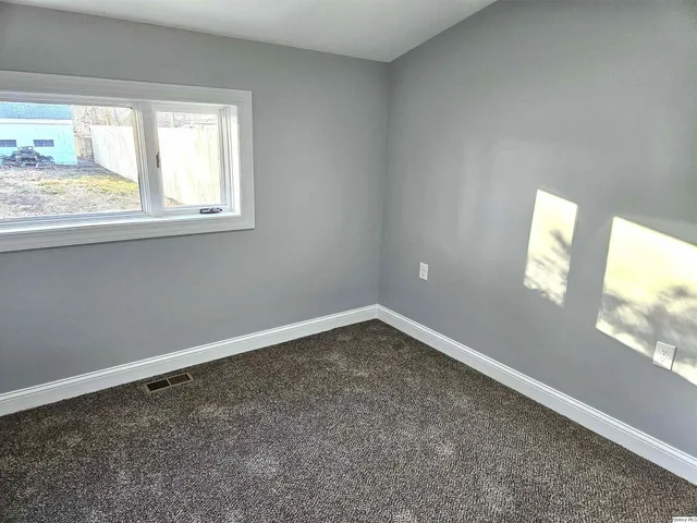 an empty room with closet