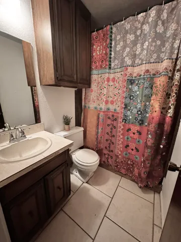 a view of a porch with a small yard