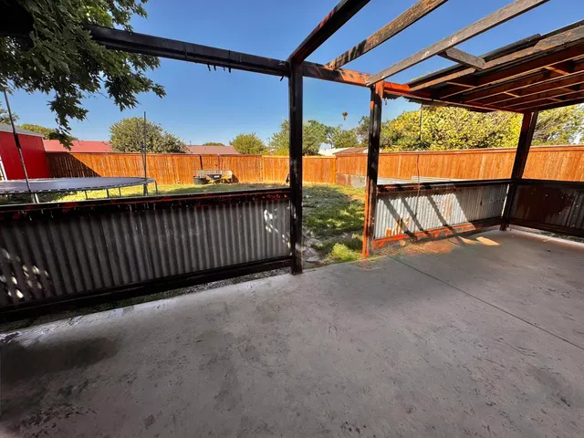 a view of outdoor space with deck and outdoor seating