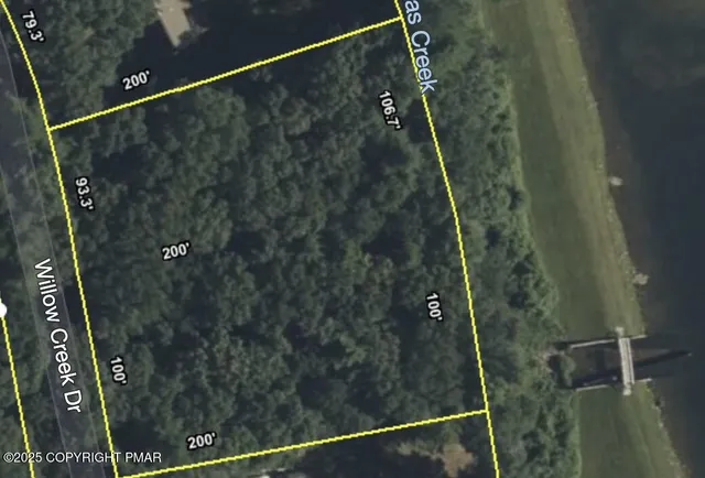 a bathroom with a shower and vanity