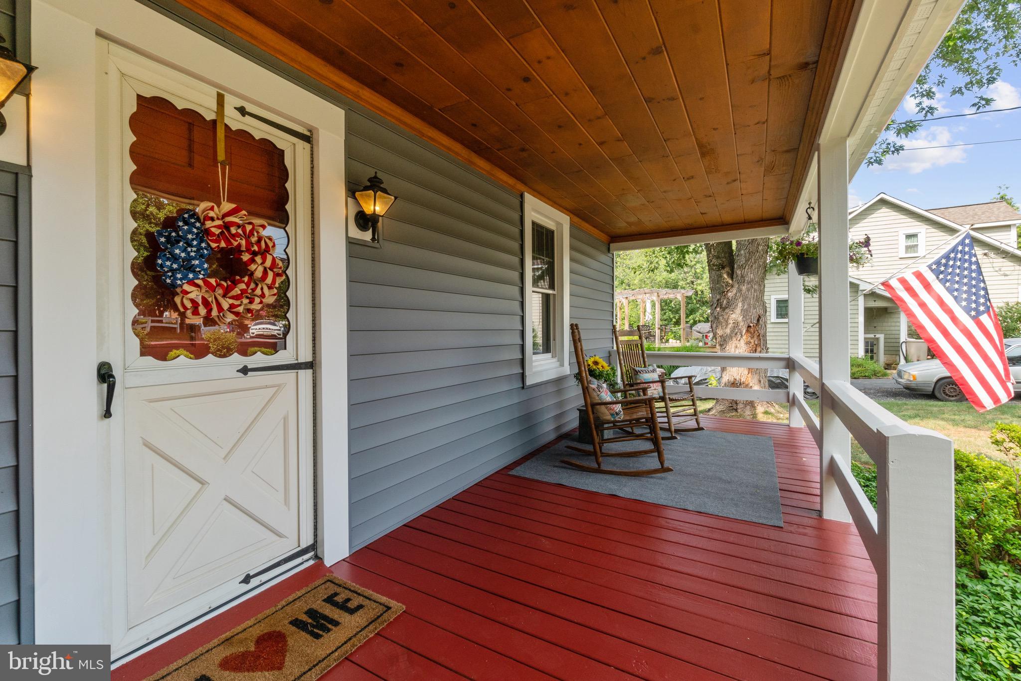 2017 Drummond Road Baltimore, MD 21228 - Photo 11 of 50 Newer wood floor, ceiling and railings