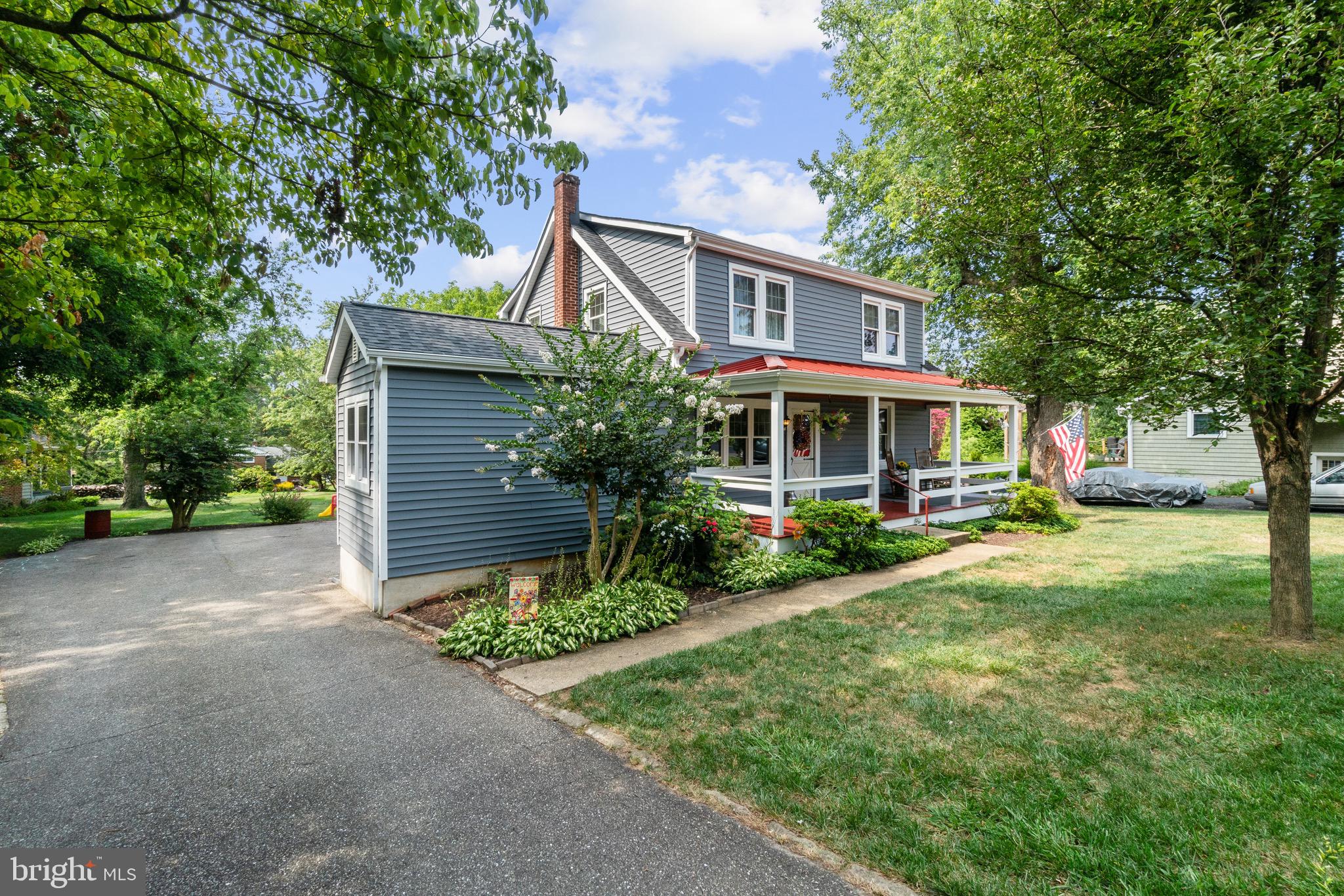 2017 Drummond Road Baltimore, MD 21228 - Photo 3 of 50 Vinyl railings surround covered porch