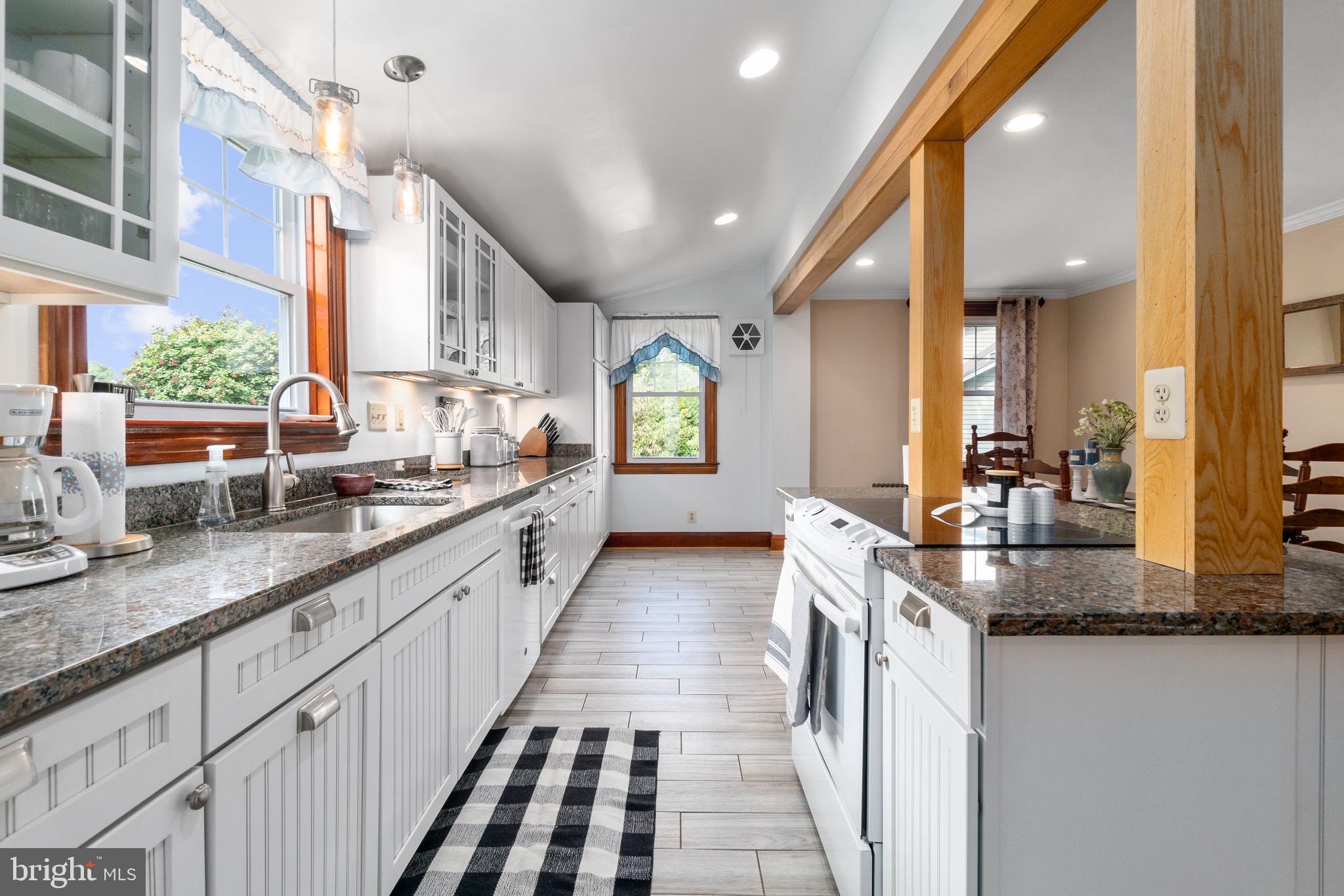 2017 Drummond Road Baltimore, MD 21228 - Photo 33 of 50 Natural wood beam accent this kitchen area