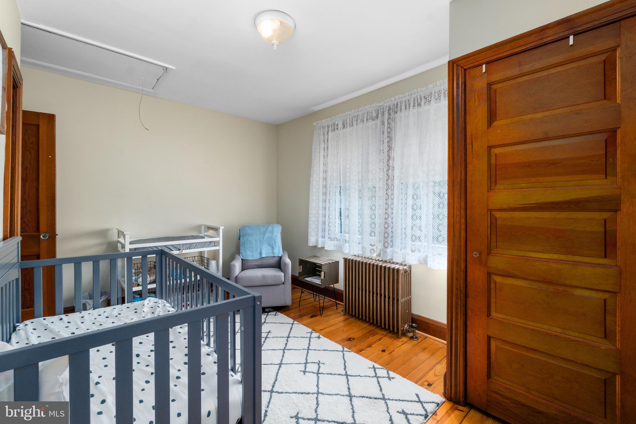 2017 Drummond Road Baltimore, MD 21228 - Photo 44 of 50 Bedroom # 4 - nursery also with natural wood doors