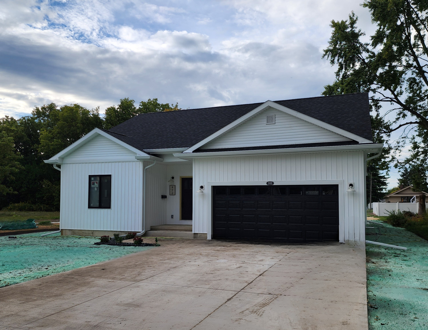 422 View Street Ottawa, IL 61350 - Photo 1 of 22 a front view of a house with a yard and garage