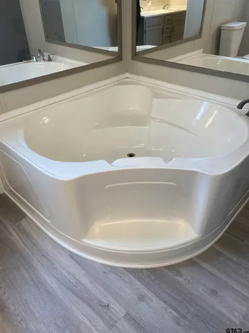 a bathroom with a bathtub