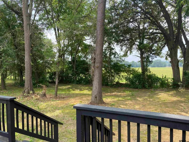 a view of a lake from a balcony