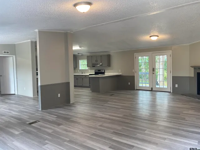 a view of kitchen and windows