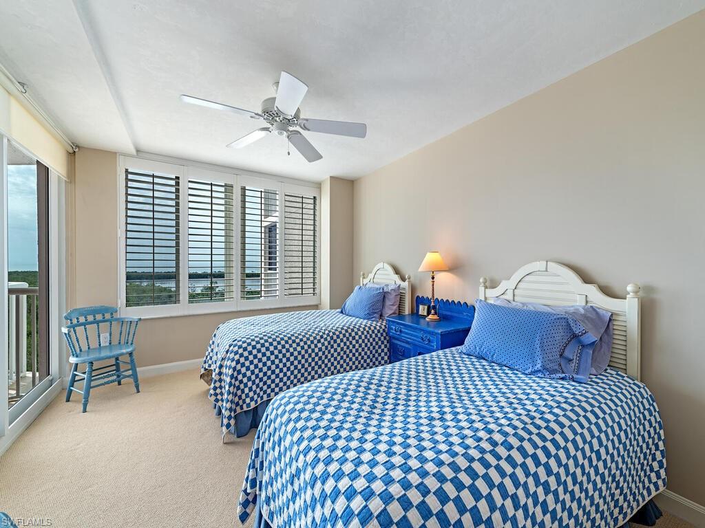 6849 Grenadier Boulevard, Unit 802 Naples, FL 34108 - Photo 4 of 19 Screened Enclosed Balcony looking South