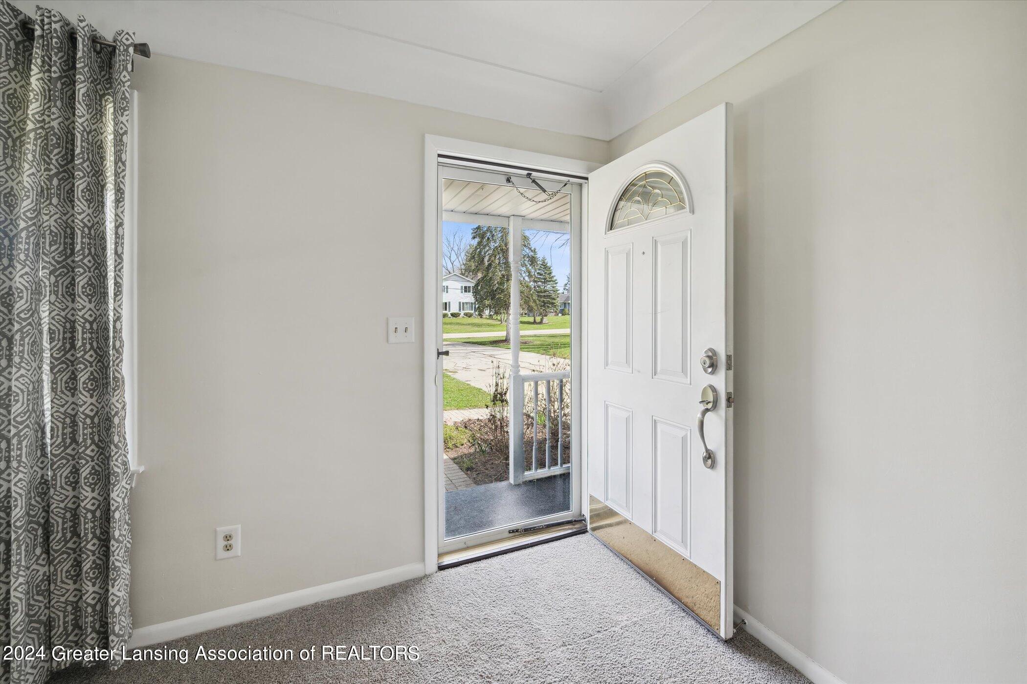 2385 Pine Tree Road Holt, MI 48842 - Photo 31 of 55 In-Law Entrance
