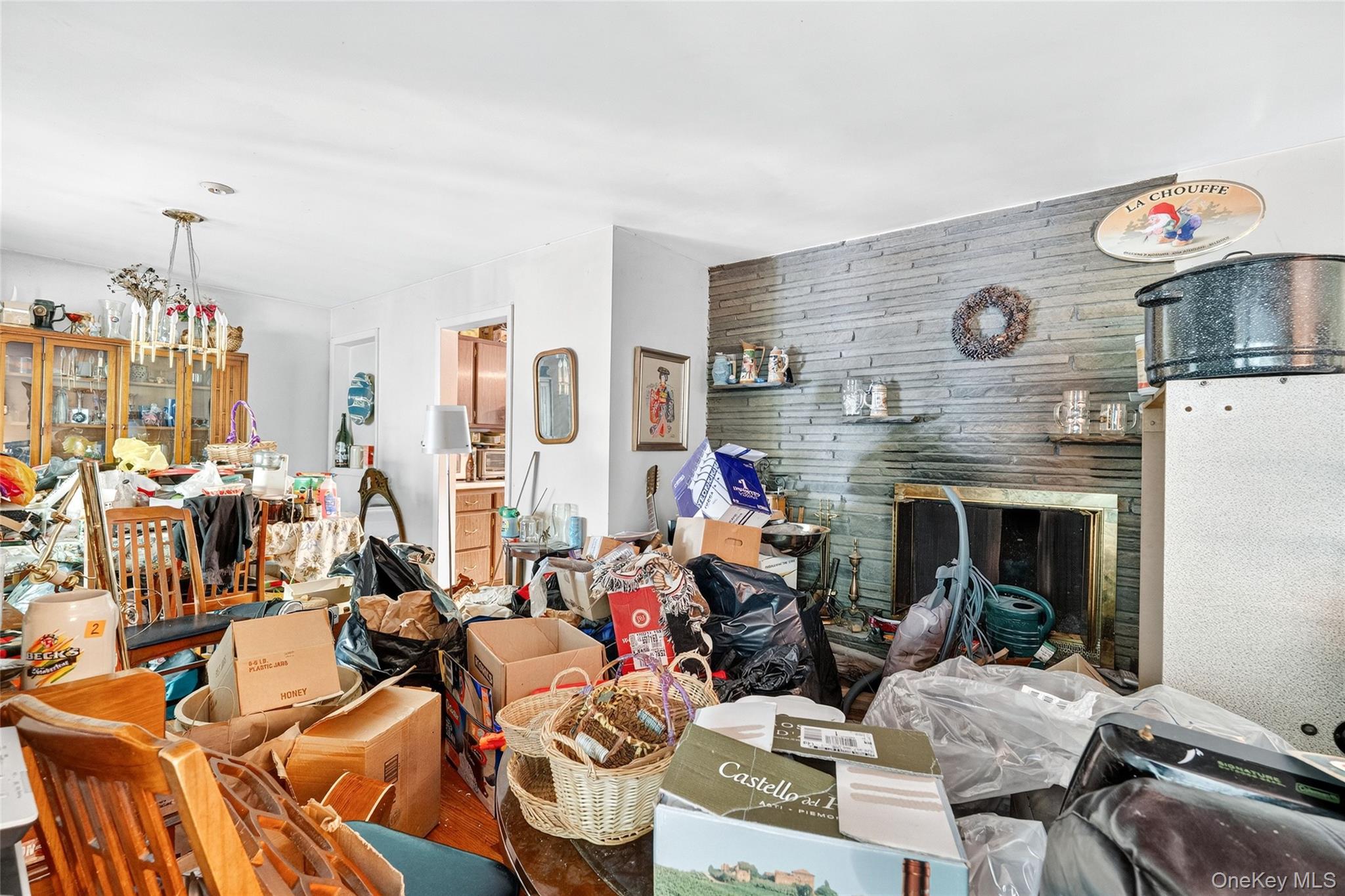 25 Russell Road Newburgh, NY 12550 - Photo 20 of 39 Living area with wooden walls and wood finished floors