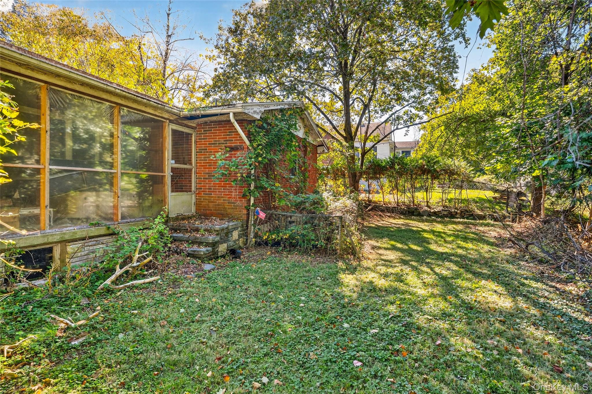 25 Russell Road Newburgh, NY 12550 - Photo 36 of 39 View of grassy yard featuring a sunroom