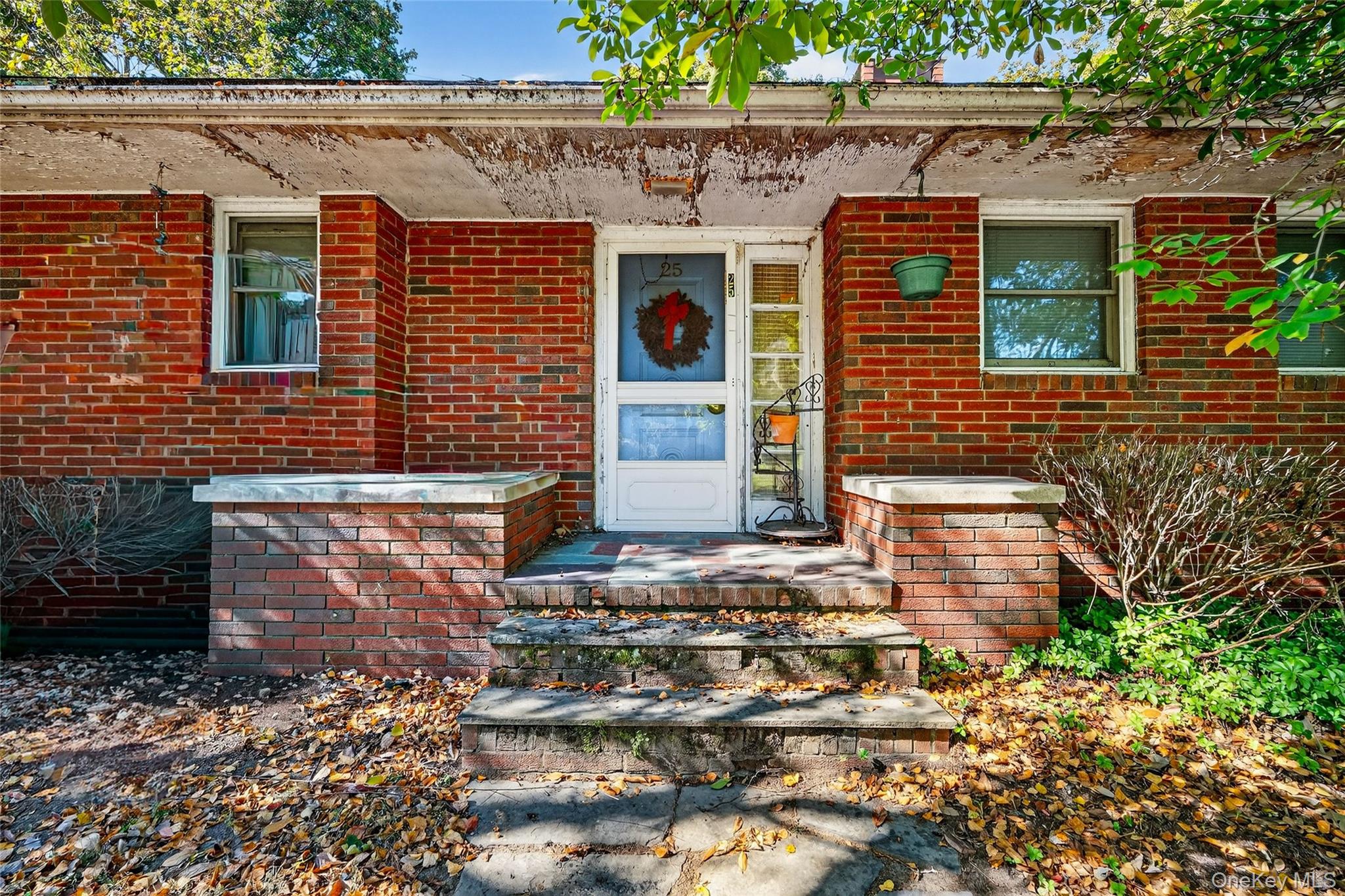 25 Russell Road Newburgh, NY 12550 - Photo 5 of 39 Doorway to property with brick siding