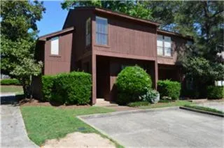 a house view with a garden space