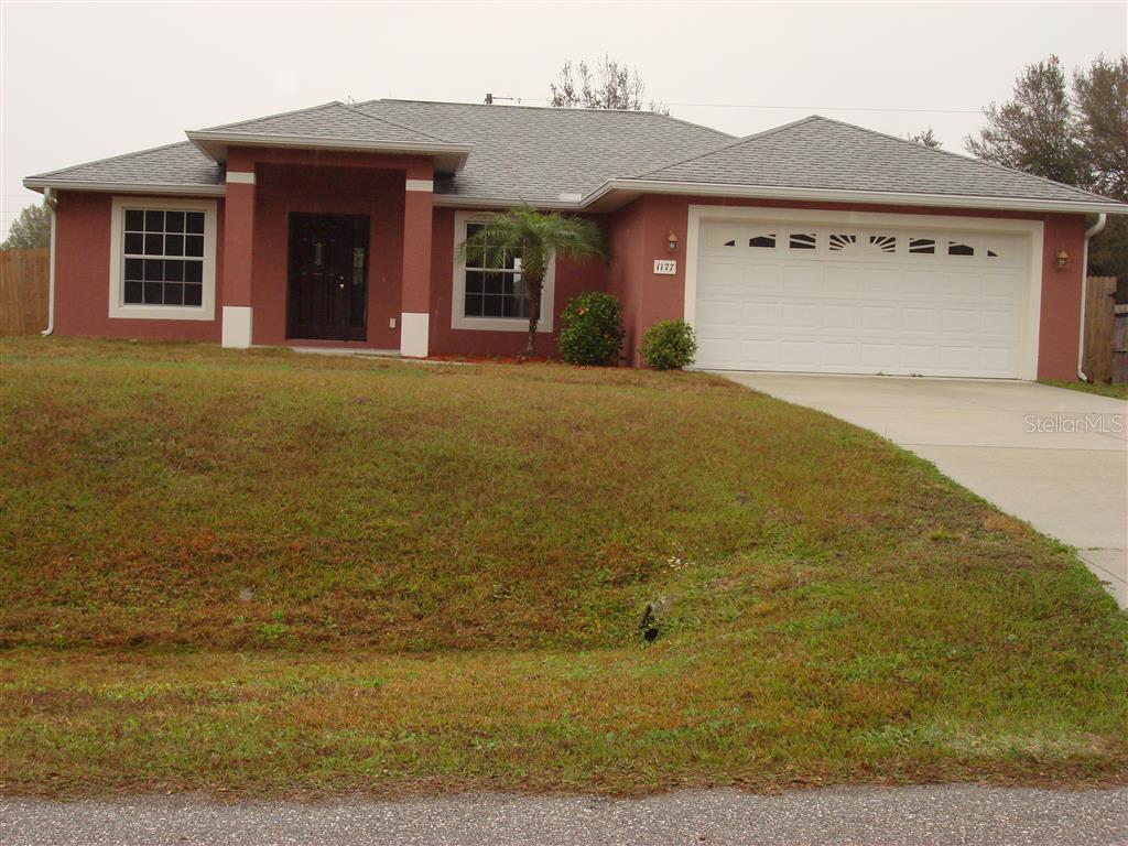 1177 Nackman Road North Port, FL 34288 - Photo 1 of 1 front view of a house with a yard
