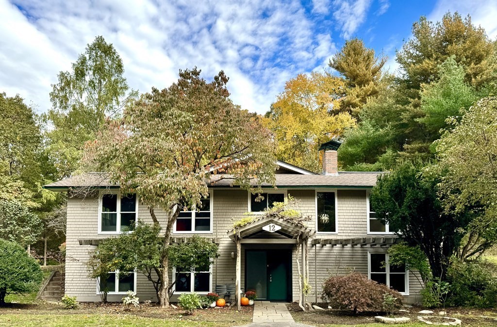 12 Ellis Road Weston, MA 02493 - Photo 1 of 42 a front view of a house with a tree