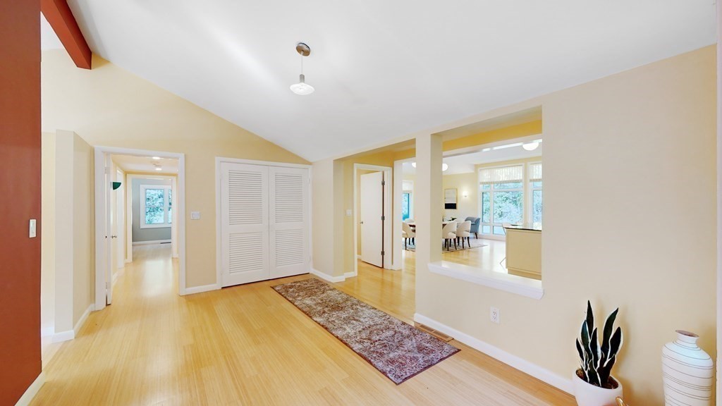 12 Ellis Road Weston, MA 02493 - Photo 11 of 42 a bedroom with a bed and wooden floor
