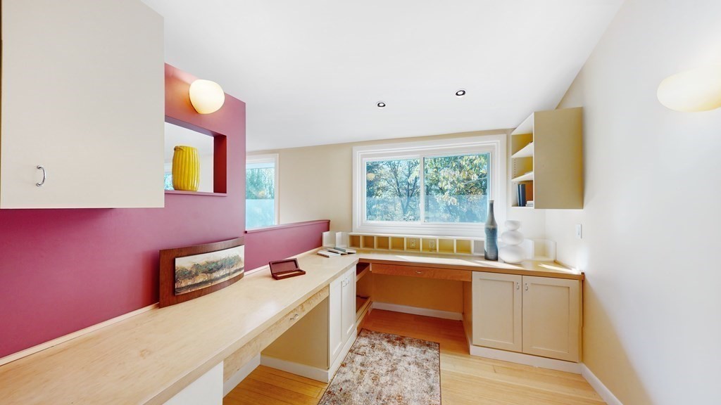 12 Ellis Road Weston, MA 02493 - Photo 16 of 42 a living room with furniture and a large window