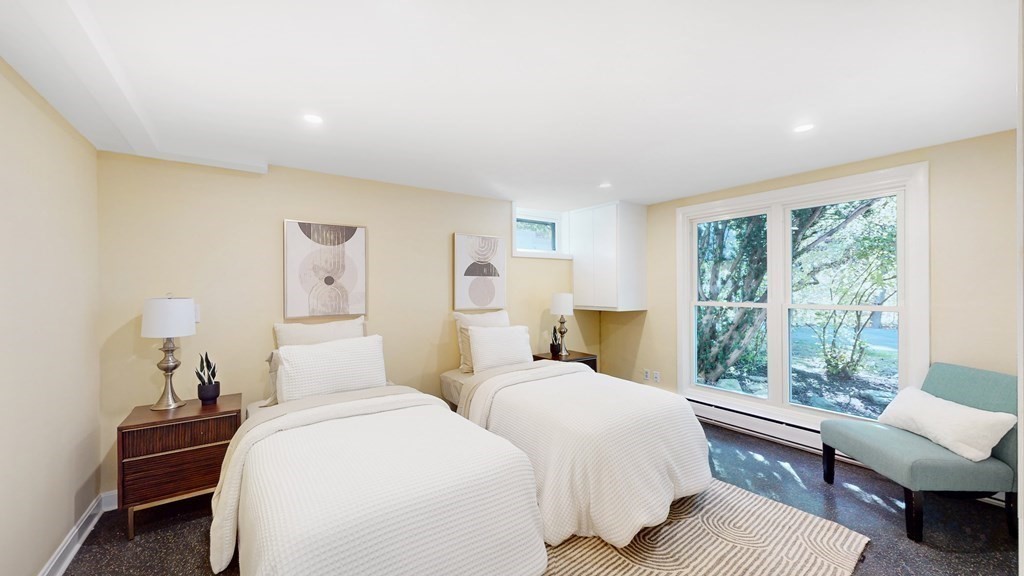 12 Ellis Road Weston, MA 02493 - Photo 23 of 42 a bedroom with two beds and a large window