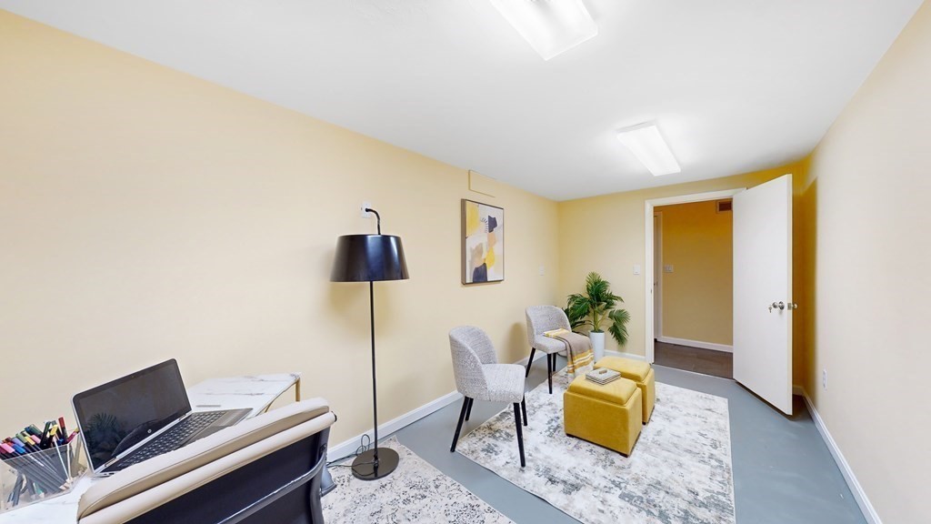 12 Ellis Road Weston, MA 02493 - Photo 26 of 42 a living room with furniture and wooden floor