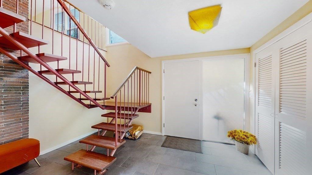 12 Ellis Road Weston, MA 02493 - Photo 30 of 42 a view of staircase with furniture and stairs