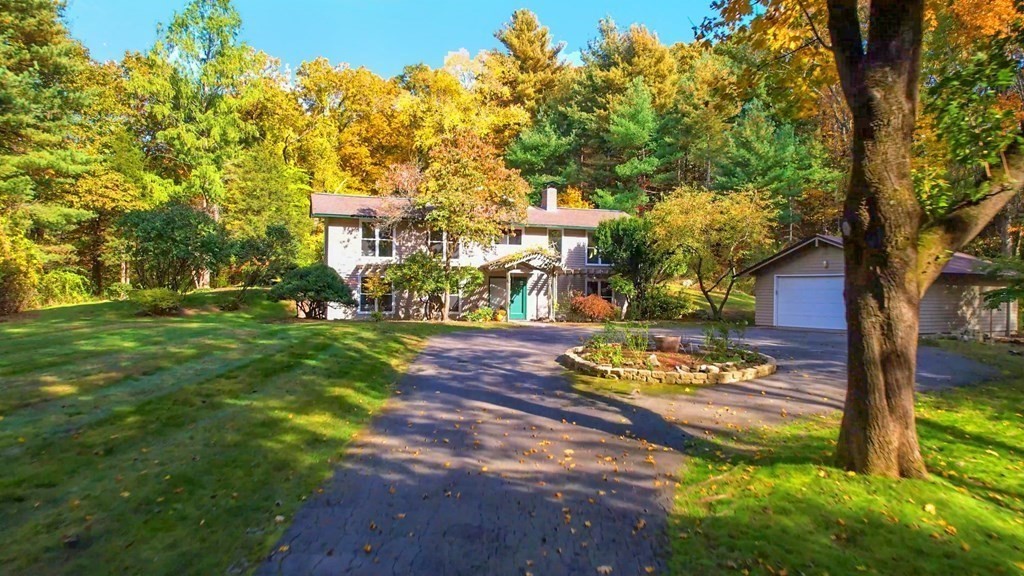 12 Ellis Road Weston, MA 02493 - Photo 31 of 42 a street view with large trees