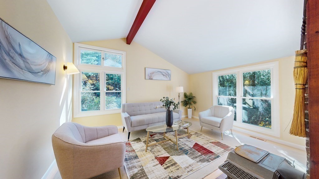 12 Ellis Road Weston, MA 02493 - Photo 8 of 42 a living room with furniture and a large window