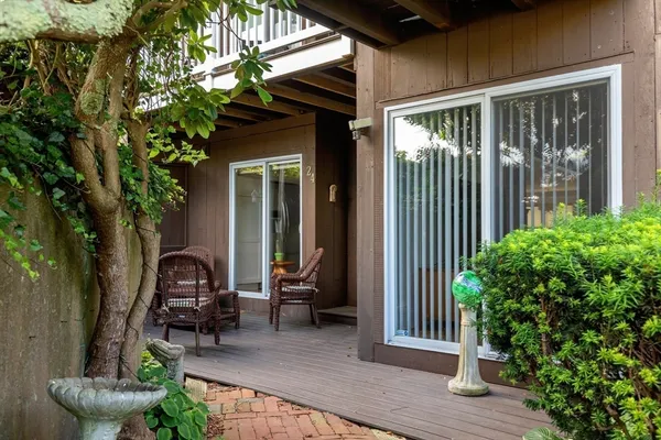 a house view with a outdoor seating space