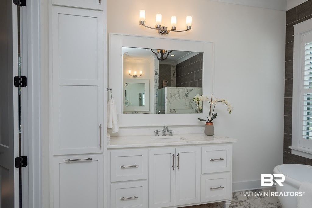 389 Pecan Avenue Fairhope, AL 36532 - Photo 26 of 50 Built in Linen Closet and Clothes hamper too