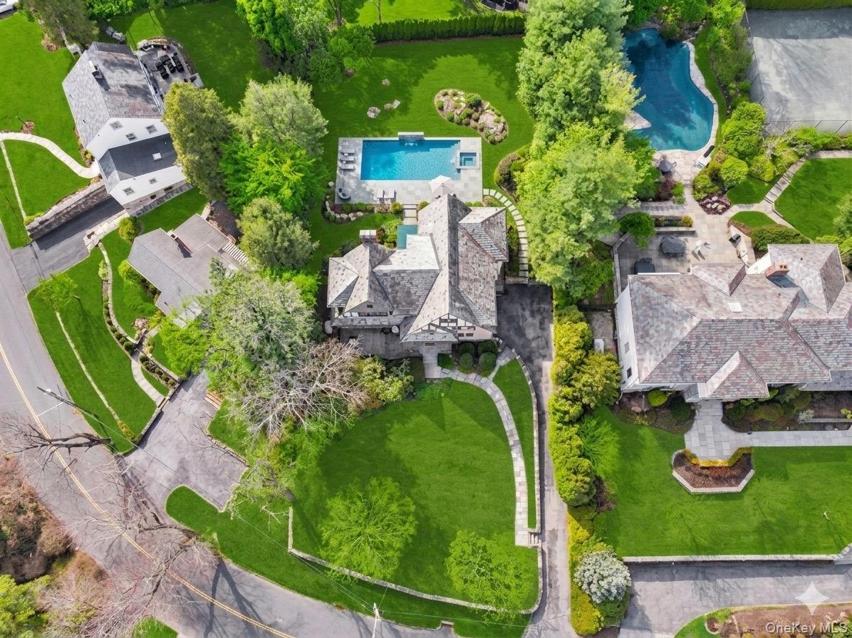 44 Fenimore Road New Rochelle, NY 10804 - Photo 42 of 46 an aerial view of a house with a yard