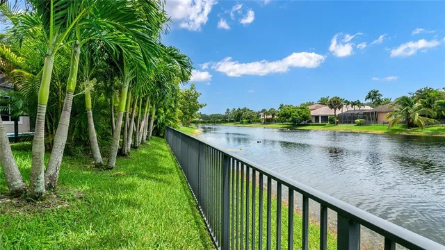 a view of swimming pool from a balcony