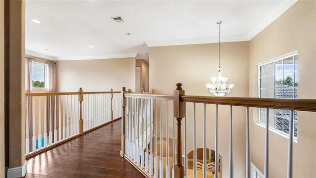 a view of staircase with large window